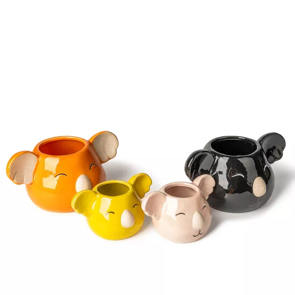 Koala ပုံသဏ္ဌာန် ကြွေဖယောင်းတိုင် ကိုင်ဆောင်သူများ